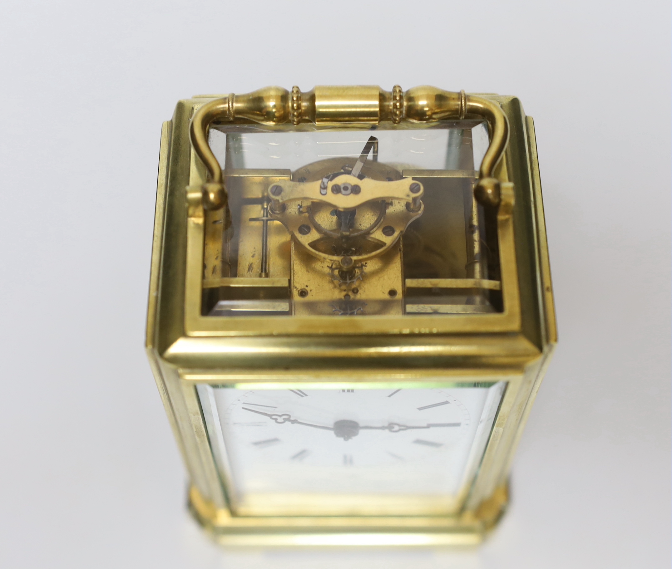 A Henry Marc French brass carriage clock with enamel dial, Japy Freres movement numbered 26934, 13.5cm including handle